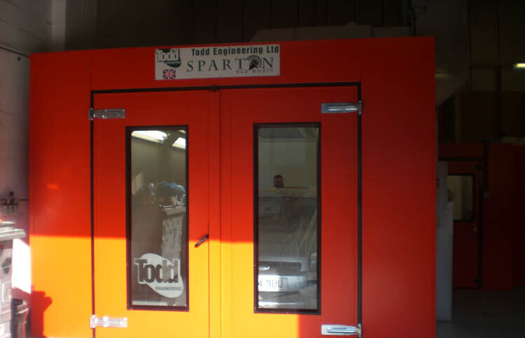 Red spray booth inside the workshop